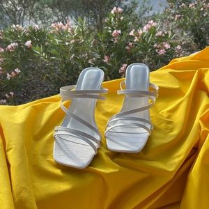 Jessica Carlyle White Heels